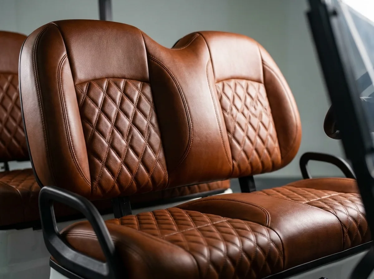 Brown seat detail in a four-seat electric golf cart
